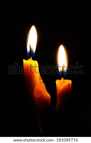 illustration of beautiful glowing candles with melted wax, suitable for Halloween holidays