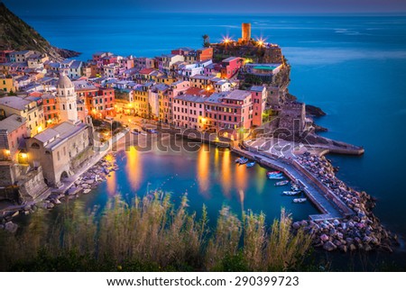 Vernazza, Liguria, Italy. The beautiful village of Vernazza as you can see it from the muntain above, during the blue hour.