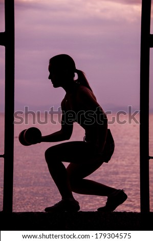 Female silhouette exercising