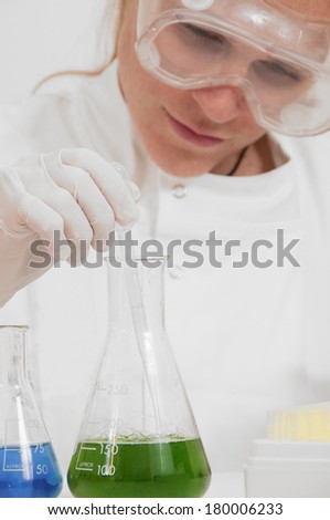Chemist at work on an experiment