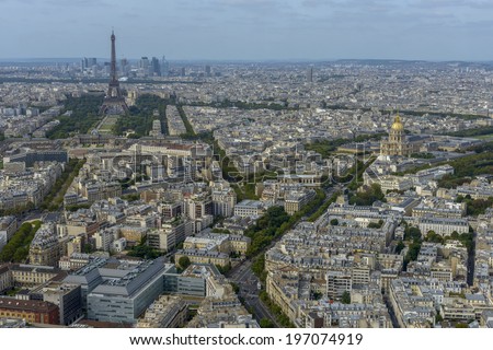 Aerial view of Paris taken from Montparnasse Tower, you can see several landmarks including Eiffel Tower.