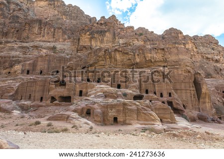 Ancient houses on Facade Street in Petra carved out of the rock in Jordan