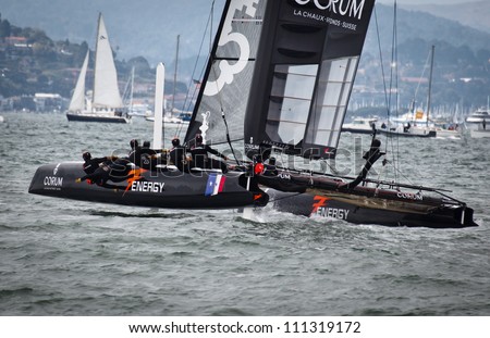 SAN FRANCISCO, CALIFORNIA, USA - AUGUST 25, 2012: French Team Energy gathers speed in the America\'s Cup Sailing races for Louis Vuitton Cup on August 25, 2012 in San Francisco Bay, California
