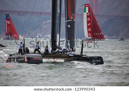 SAN FRANCISCO - AUGUST 25: American Team waves to crowd at America\'s Cup Sailing races for Louis Vuitton Cup on August 25, 2012 in San Francisco Bay, where cup finals will be held summer 2013.