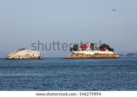 SAN FRANCISCO, CALIFORNIA - FEBRUARY 16: Colorful view of The Brothers Island light house, at dawn on February, 16, 2013.San Francisco is currently hosting the 2013 Americas Cup sailing races.