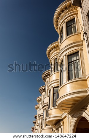 Curved windows of San Francisco row houses seen from side