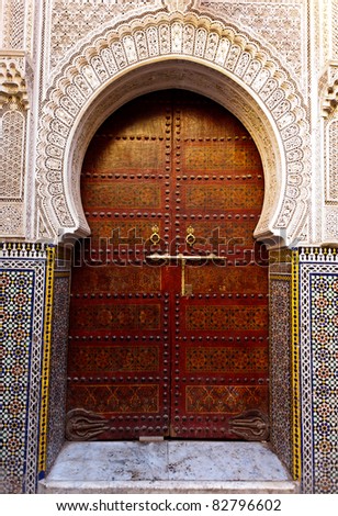 Fez, Morocco: Ornate exterior wooden door of mosque, Fez, Morocco