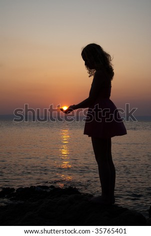 Mermaid holding sun
