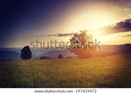 Morning in mountains with Sun rising rural scenery