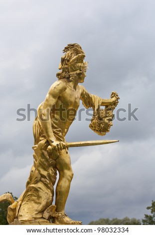 Ancient Greek hero Perseus with the head of the Gorgon Medusa. Sculpture of large cascade. Peterhof.