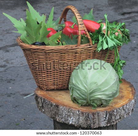 Fresh organic vegetables in a wooden basket