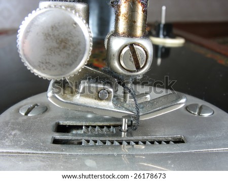 Old industrial sewing machine detail macro close up