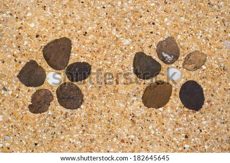 Flower rock shape decorated in small rocks and fine stone in the