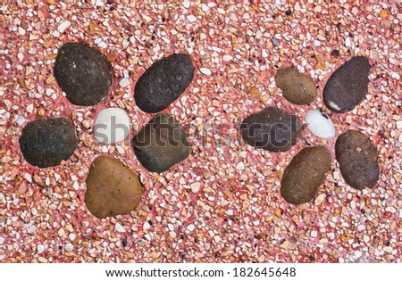 Flower rock shape decorated in small rocks and fine stone in the
