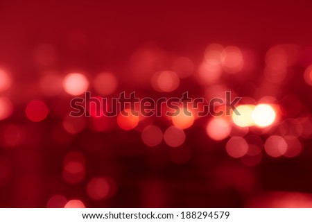 Red tone blur bokeh light. Defocused background.