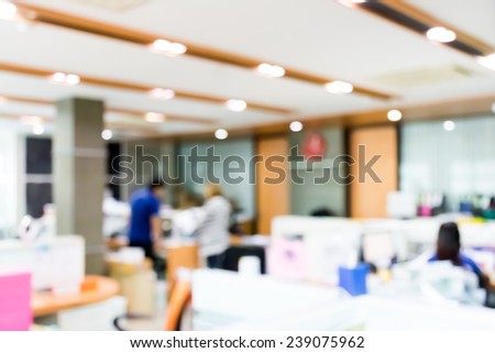 People in office organization blur background with bokeh.