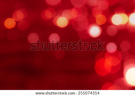 Red tone blur bokeh light. Defocused background with space.
