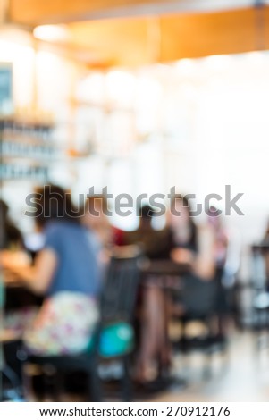 Defocused blur background of people  in coffee shop restaurant.