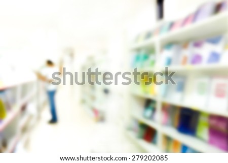 Blur background of people in library book store.
