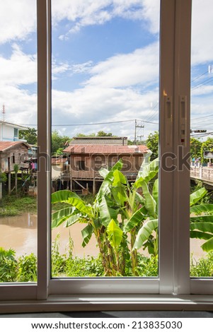 View through a window in river side,Thailand