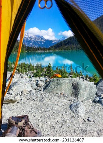 Camping tent with a beautiful view of a lake in Vancouver, British Columbia, Canada.