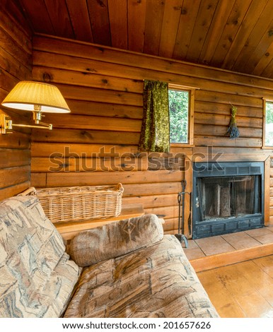 Cozy interior of a rustic log cabin.
