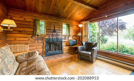 Cozy interior of a rustic log cabin.