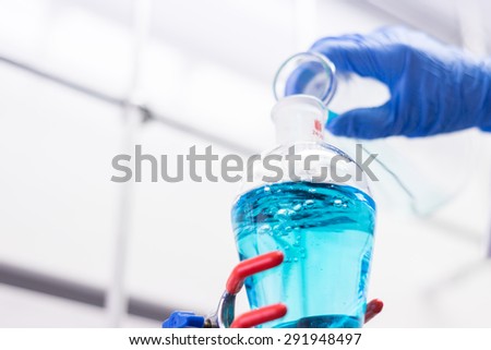 Transferring Liquid from a Erlenmeyer to a Funnel in an Organic Chemistry Lab
