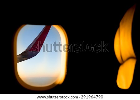 Sunset in a Flight and illuminated seat