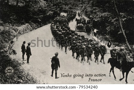 Yanks Going into Action France - Early 1900 postcard depicting Yankee soldiers going into action in France during WWI.