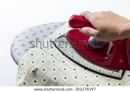 a women ironing wrinkled cloth