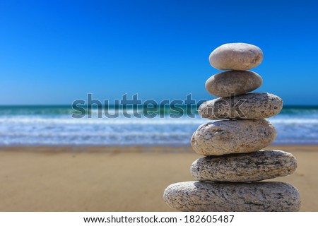 zen balance stone on the beach