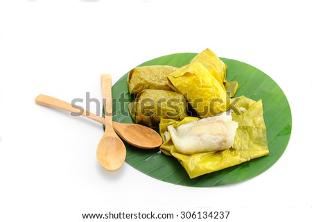 Thai Sweets bunch of mush with banana filling on banana leaf, white background