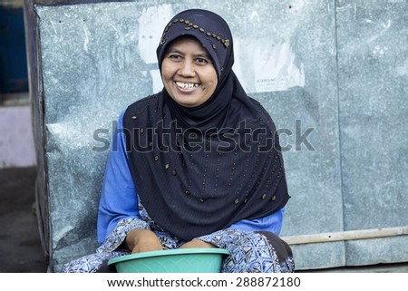 PENIDA ISLAND, INDONESIA - JUNE 17.2015: woman Muslim, village Toyopakeh, Nusa Penida June 17. 2015 Indonesia