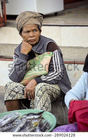 PENIDA ISLAND, INDONESIA - JUNE 21.2015:  Unidentified woman, village Toyopakeh, Nusa Penida June 21. 2015 Indonesia