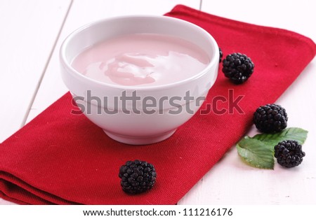 Yogurt  blackberries in the cup