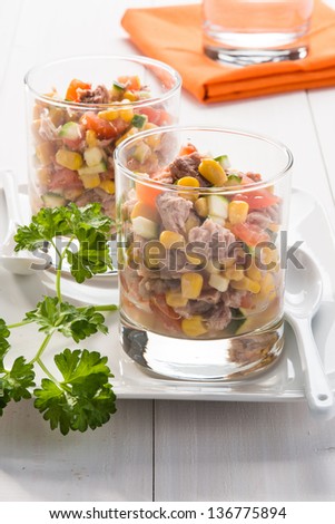 Tuna salad with corn, tomatoes and zucchini