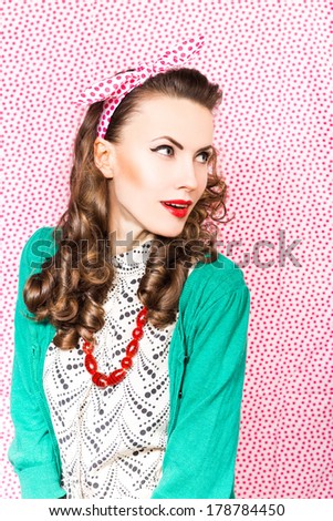 Amazement - beauty woman excited looking to the side. Surprised happy young woman looking sideways in excitement. copy space