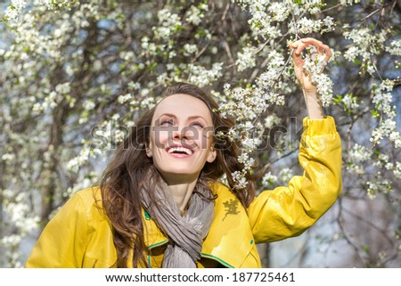 Happy carefree woman enjoy the freshness of the new spring day. copy space