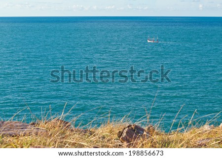Lonely boat in the middle of the sea