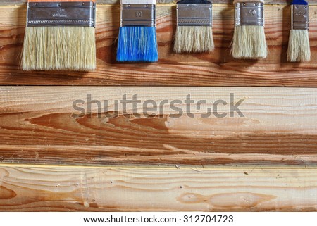 Brushes for painting walls lined on top