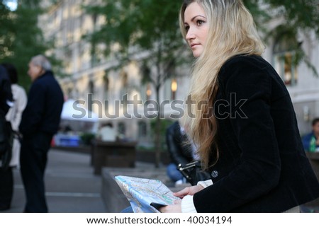 beautiful tourist with New-York map