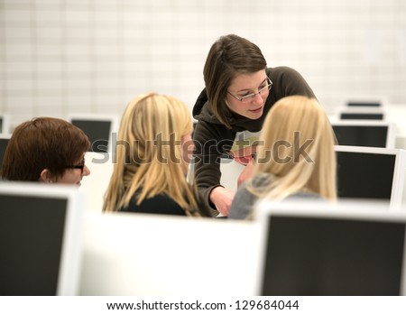 young female student work with personal computer