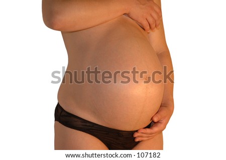 stock photo A naked pregnant woman without background