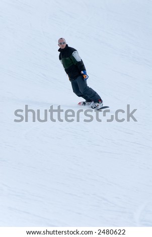 snowboarding man taking a ride