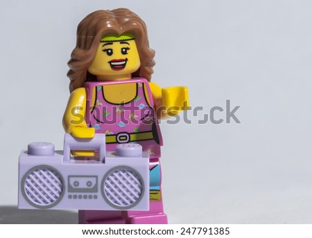 NARVA, ESTONIA - JANUARY 27: A Lego toy of a lady fitness instructor in a sportive costume and radio in Narva, Estonia on January 27