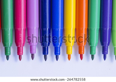 Coulourful markers on white background