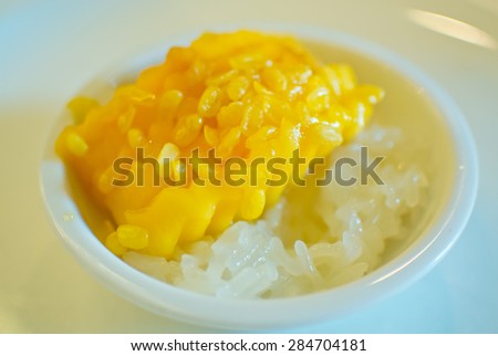 Sweet mango with sticky rice and coconut milk and soy bean (Thailand style)