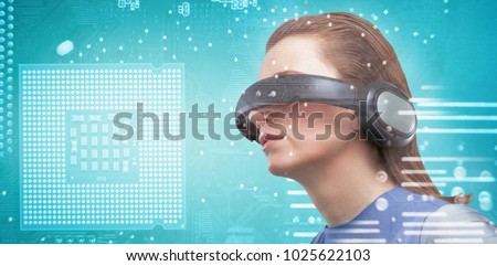 Low angle view of woman trying virtual reality against micro parts in computer chip