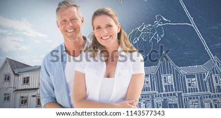 Happy couple against nice residence with a blue and white filter